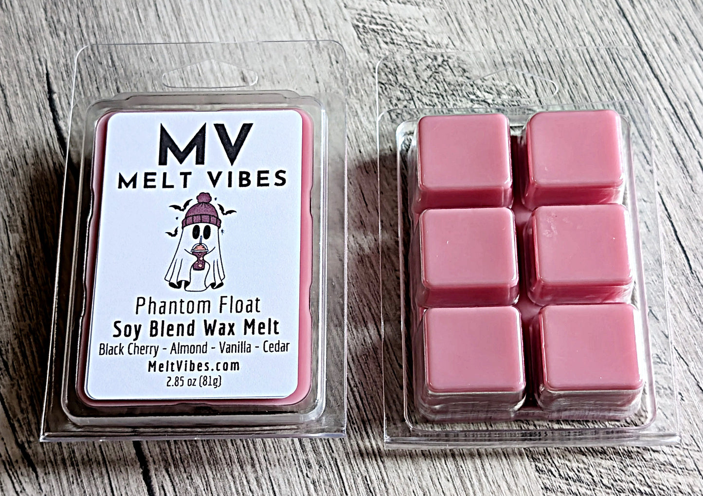 Pink wax melts in a clear packaging with 'Melt Vibes' label on a wooden surface