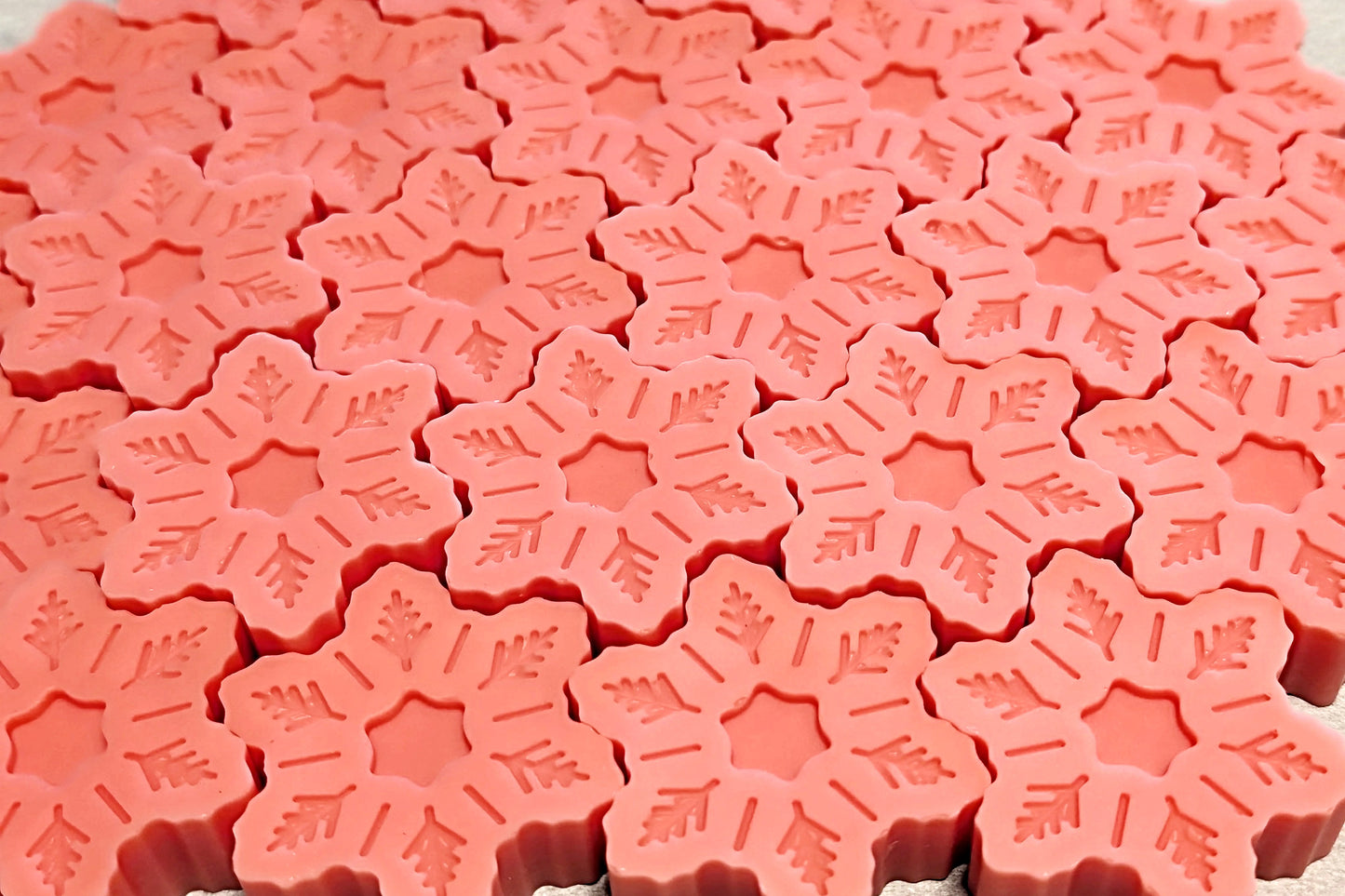 Close-up of pink snowflake wax melts