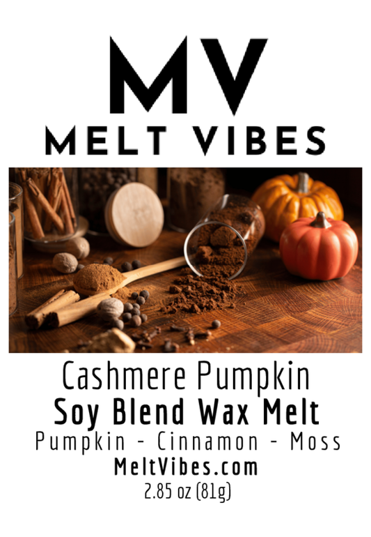 MV Melt Vibes logo, pumpkin, spices, and wax melt on wooden surface, text about Cashmere Pumpkin scent.