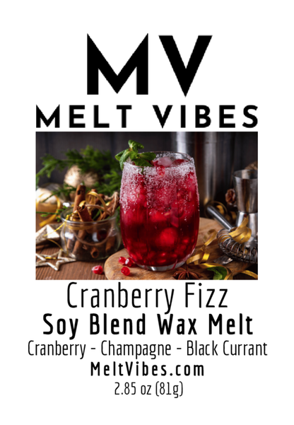 Cranberry drink with mint garnish on a wooden board, surrounded by festive decor. Text: Melt Vibes.
