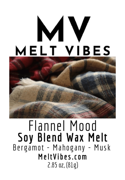 Plaid flannel fabric in warm colors, text reads: MV Melt Vibes, Flannel Mood Soy Blend Wax Melt.