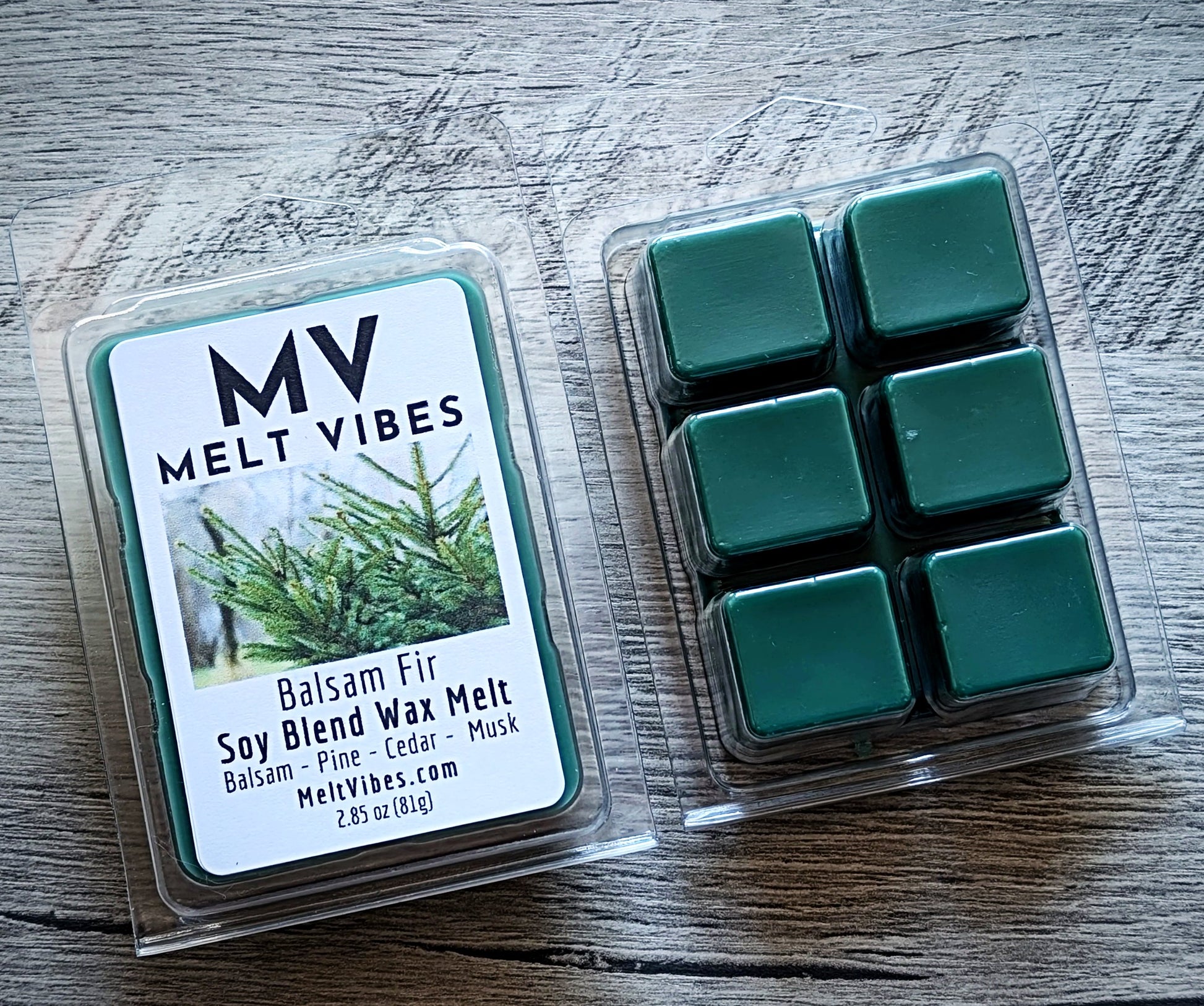 Melt Vibes Balsam Fir wax melts packaging on a wooden surface
