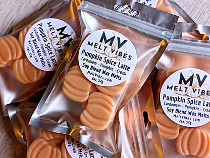 Pumpkin spice latte wax melts in clear packaging with visible 'Melt Vibes' labels.