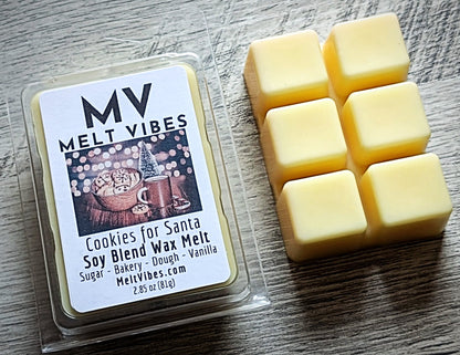 Melt Vibes wax melt packaging with six yellow wax cubes on a wooden surface