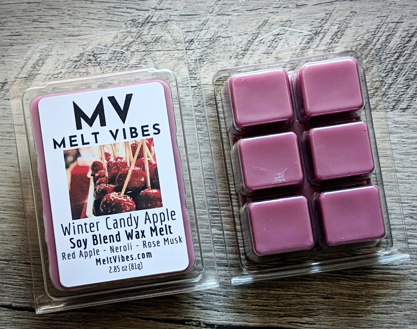 Melt Vibes wax melts packaging on a wooden surface