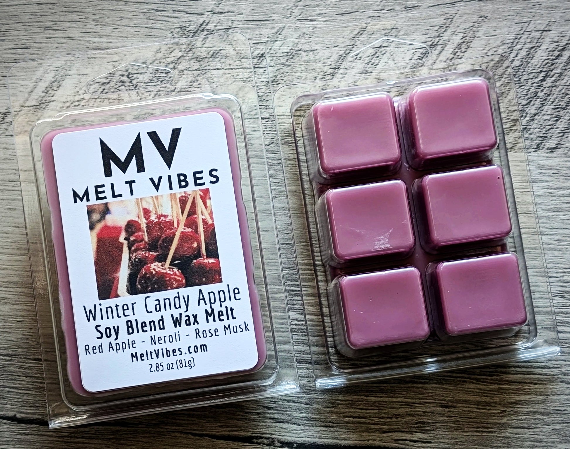 Melt Vibes wax melts packaging on a wooden surface