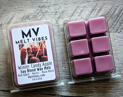 Melt Vibes wax melts packaging on a wooden surface
