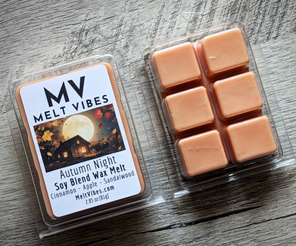 Melt Vibes wax melts packaging on a wooden surface