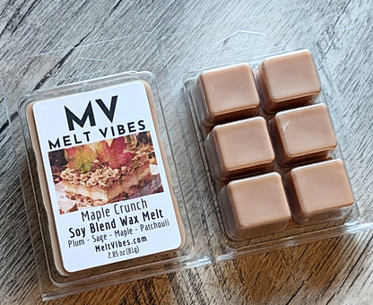Wax melts in a clear packaging with 'Melt Vibes' label on a wooden surface